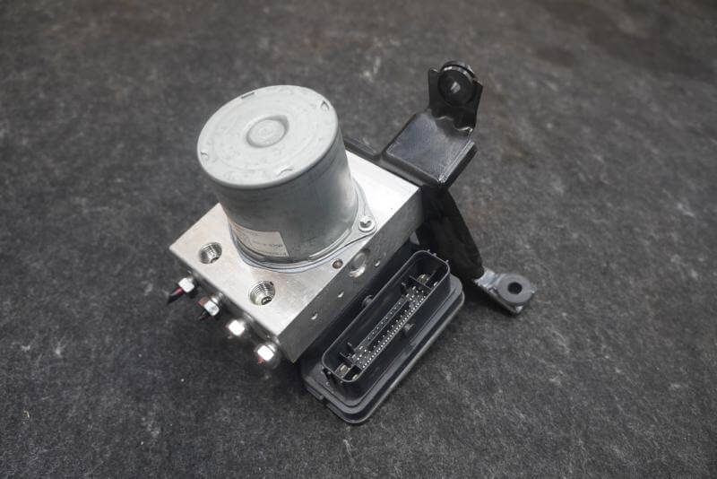 Used OEM 2022 - 2023 Rivian R1S Anti Lock Brake Pump Module ABS Pump on display