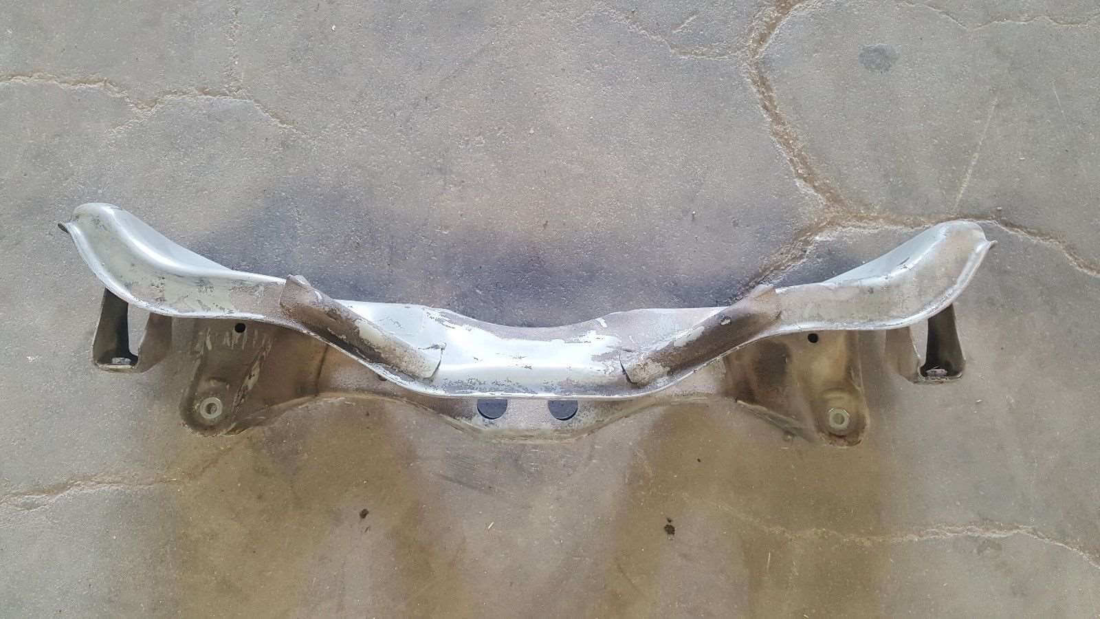 1996-2000 Subaru Legacy Outback Front Subframe Engine Crossmember Sub Frame Cradle 2.5L, used OEM part, shown on concrete surface