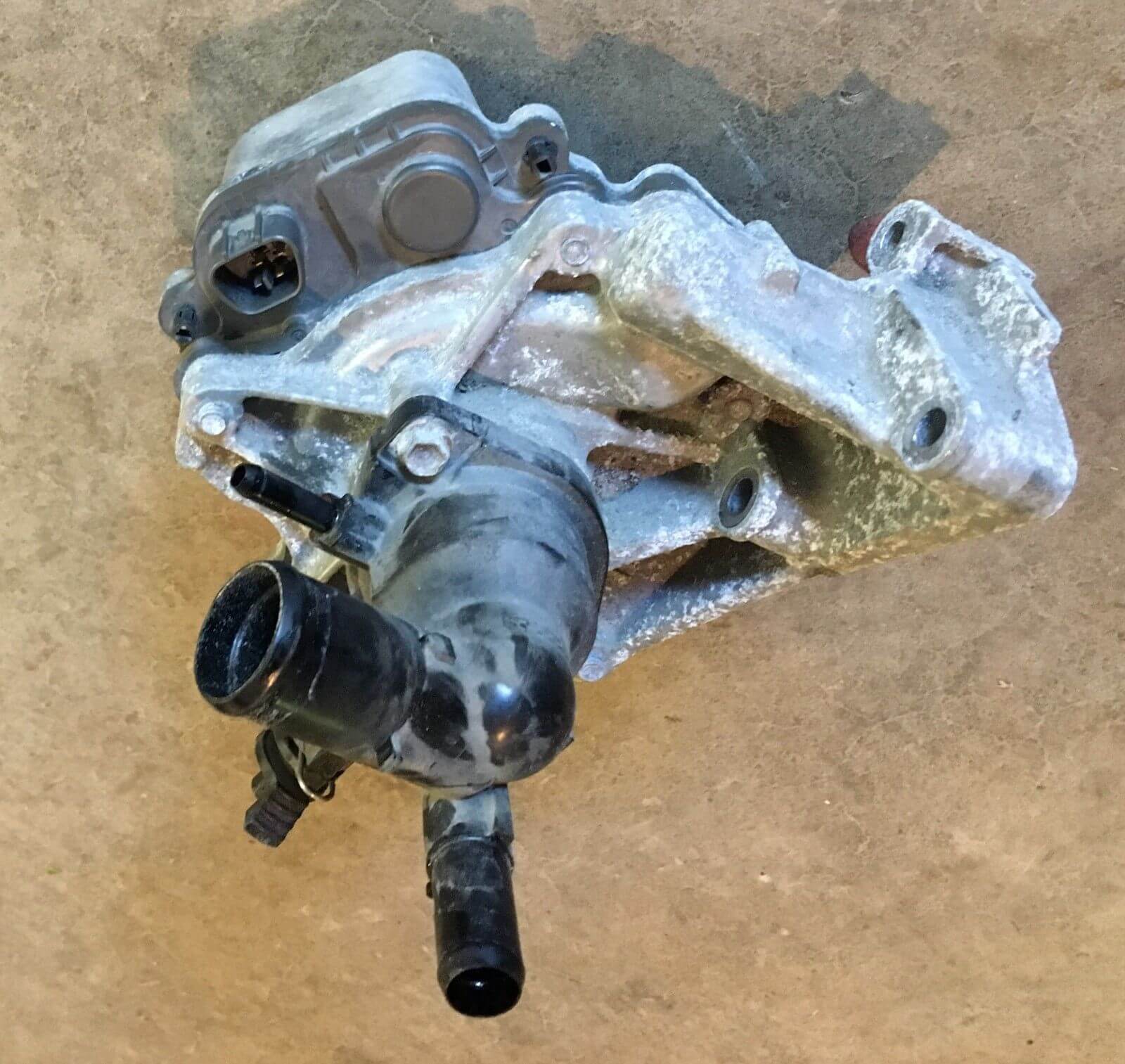 2012-2014 Toyota Prius C 1.5L Water Pump W/ Coolant Thermostat Housing, used OEM part, excellent condition, GreenGears Auto
