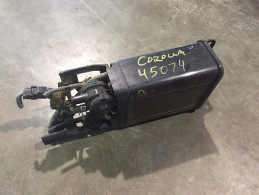1998 1999 Toyota Corolla 1.8L Fuel Emissions Charcoal Vapor Canister EVAP used OEM part, excellent condition with 1-year warranty.